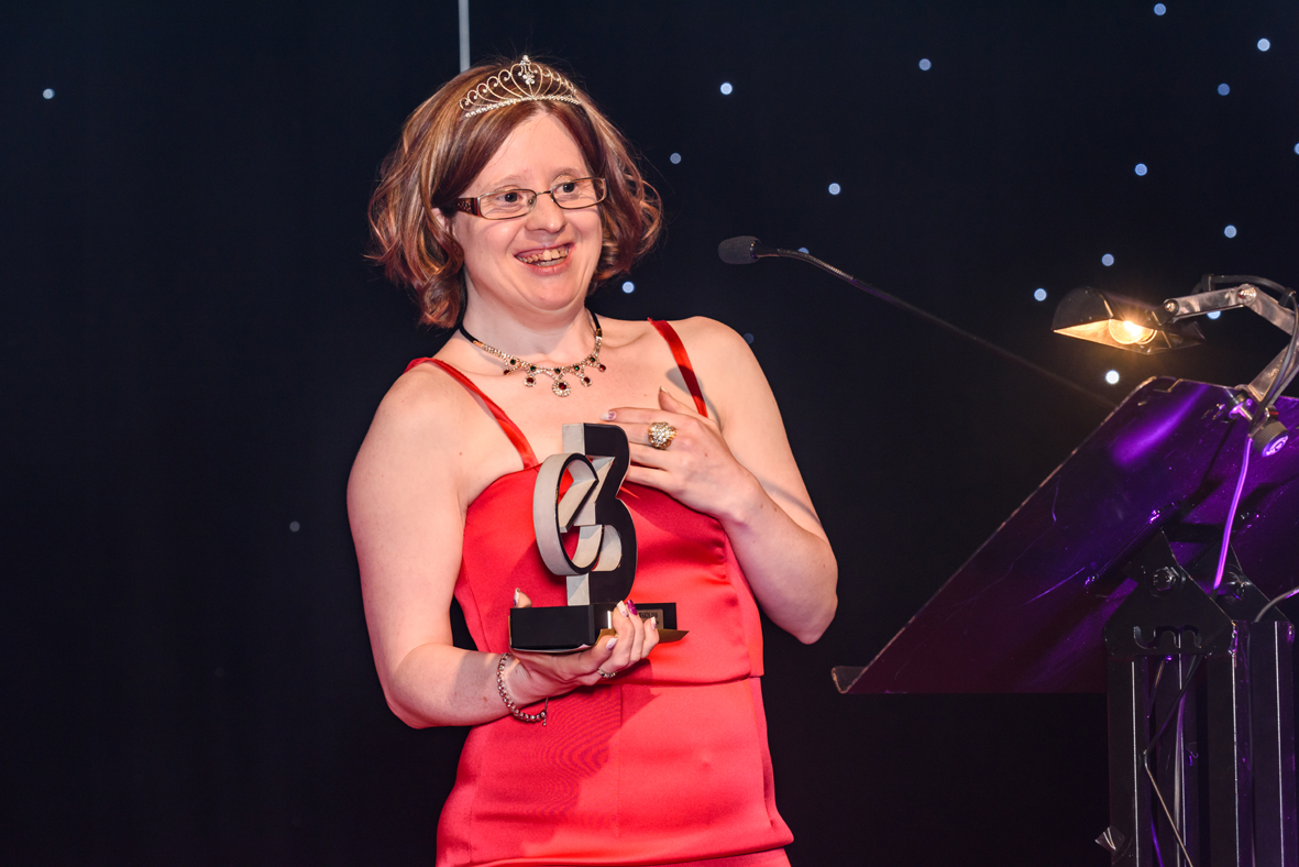 A photo of Jen Blackwell with a previous award