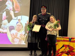 DanceSyndrome Dance Leaders Becky Rich (left) and Eliza Boothby (right) receiving their award from the High Sheriff